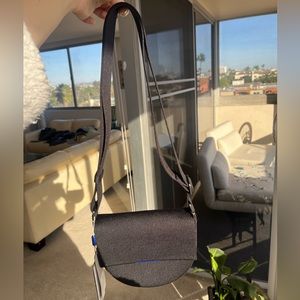 Rothy’s The Saddle Bag - Black. New with tags.